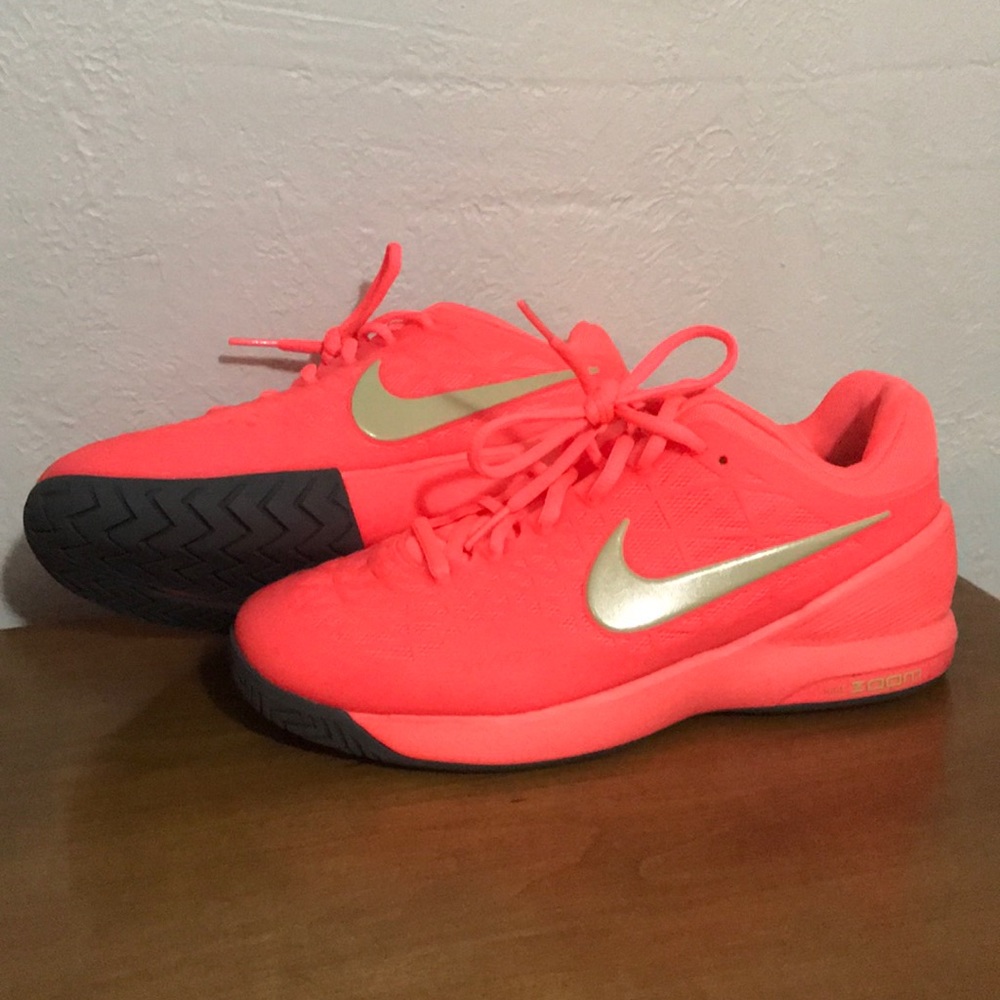 Neon pink nike tennis shoes